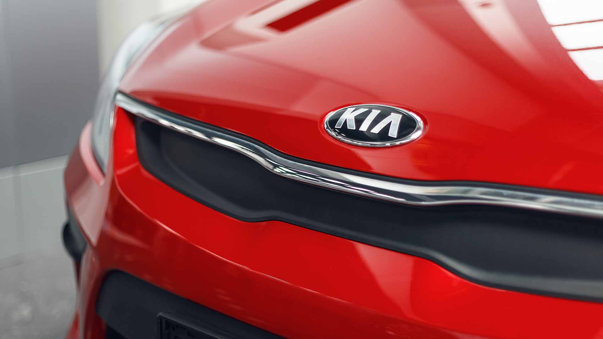 Red Kia With Badge