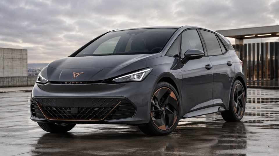 Grey Cupra Born parked on a wet roof overlooking a city skyline