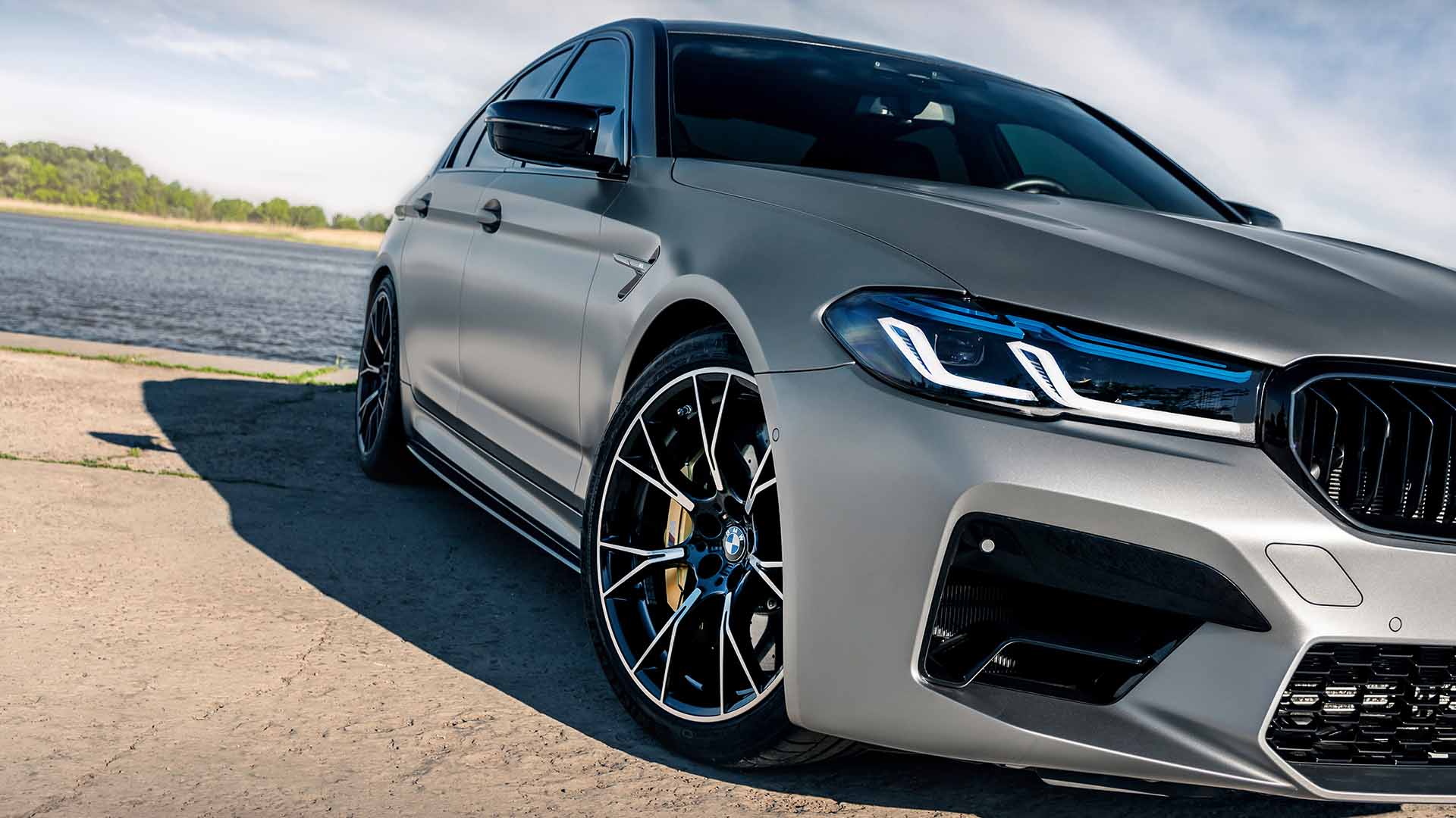 Silver Bmw Driving Fast