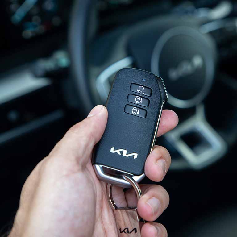 Hand Holding Kia Keys