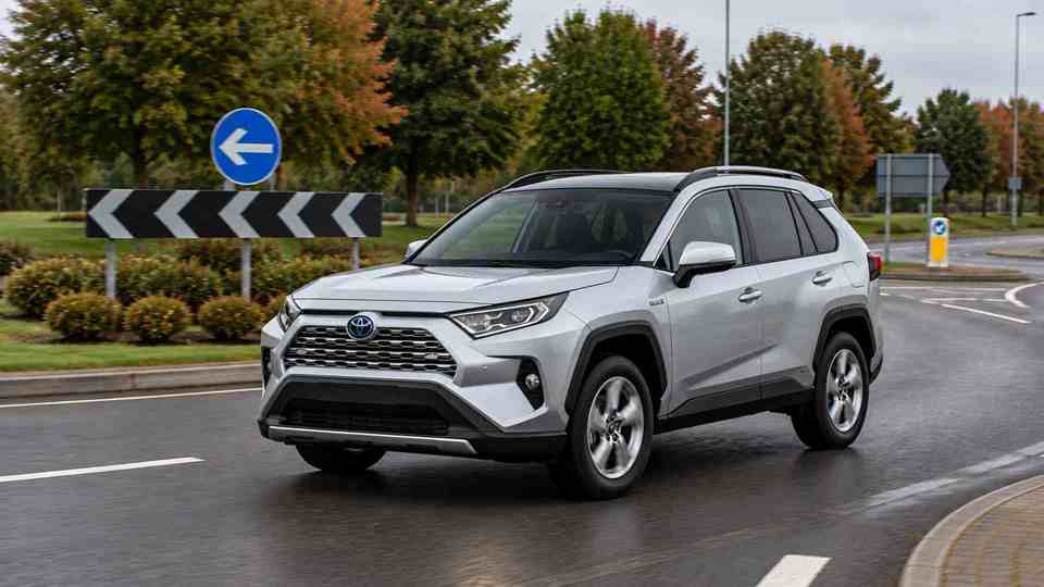 Silver Toyota RAV4 driving round a roundabout