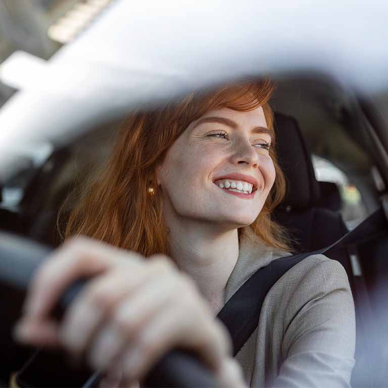 Ginger Happy Lady Behind Wheel